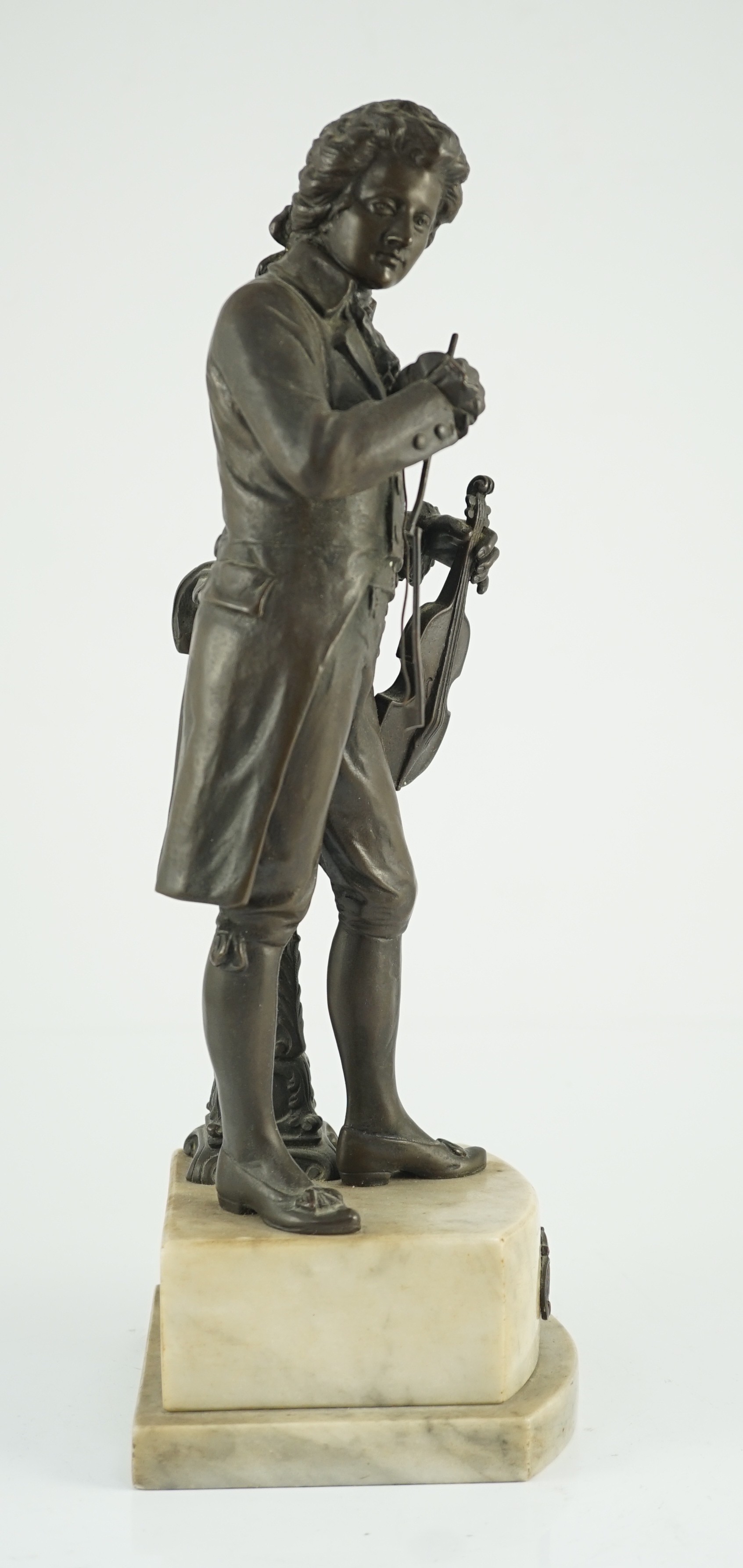 Carl Brose (German, 1880-). An early 20th century bronze figure of Mozart holding a violin, 41cm high